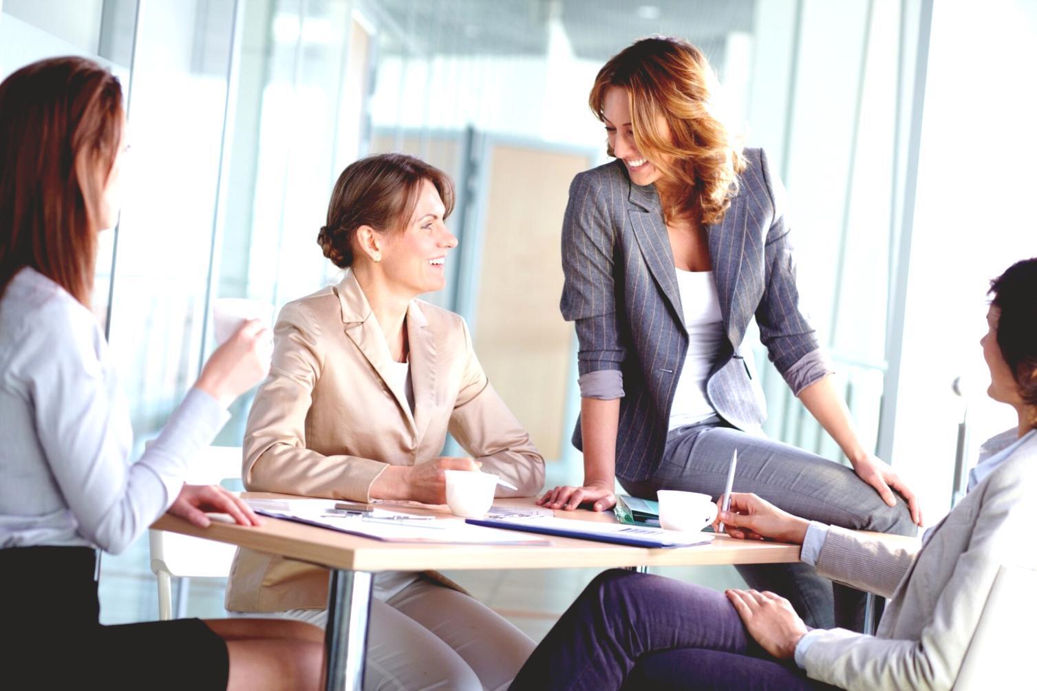 Business owner reviewing financial reports and growth metrics